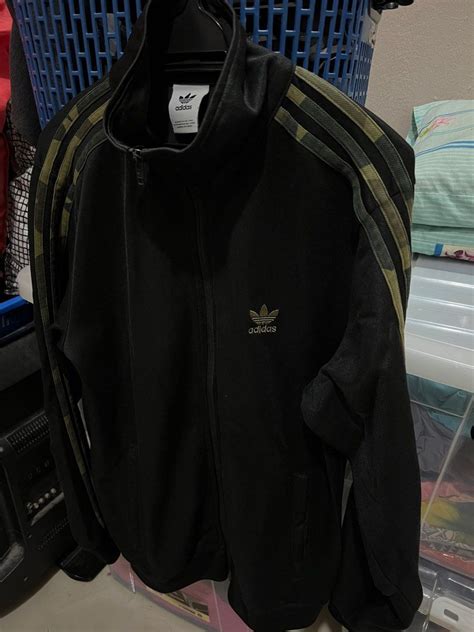 fake adidas jacket|adidas camo jacket.